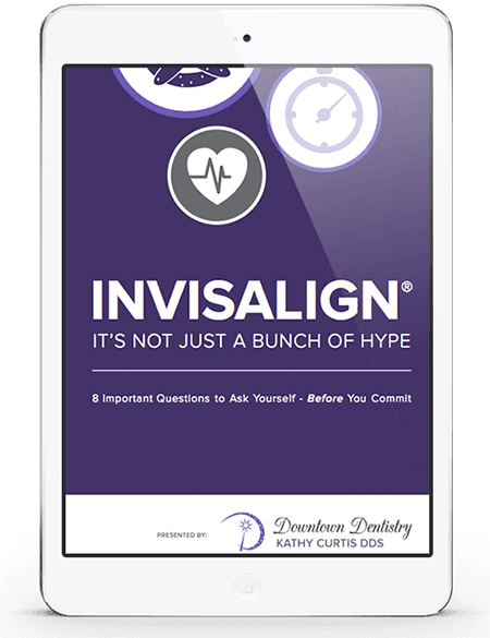 Preview of your FREE eBook from your Seattle dentist - Setting Things Straight With Invisalign being displayed on an iPhone.